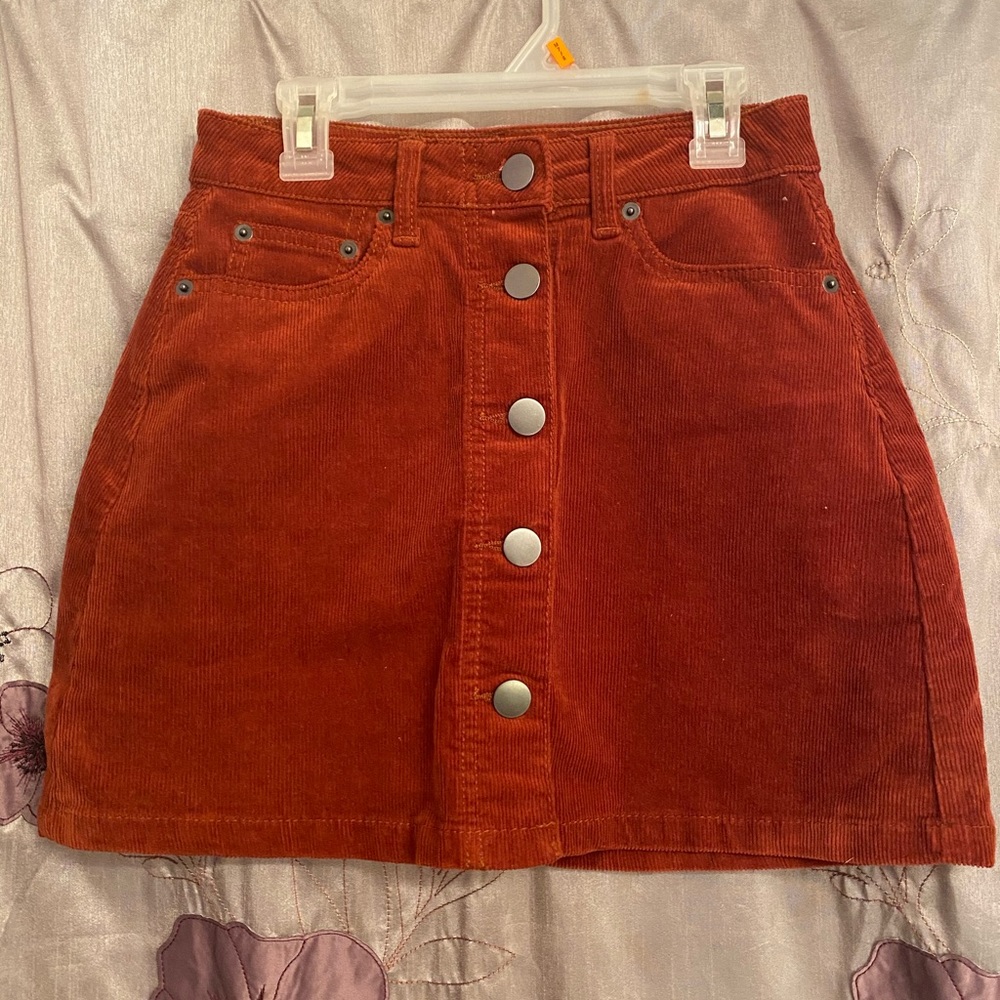 Rust colored corduroy button up skirt